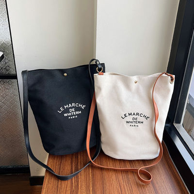 A mais recente bolsa de balde feminina de lona média de moda para a impressão de crossbody de verão de 2024