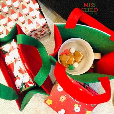 Saco de Natal personalizado de cores com Papai Noel de feltro feito à mão