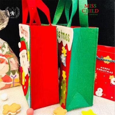 Saco de Natal personalizado de cores com Papai Noel de feltro feito à mão