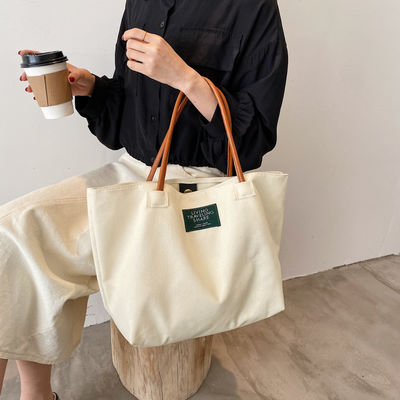 Última moda logotipo personalizado de lona bolso de grande capacidade bolsa de um único ombro estudante