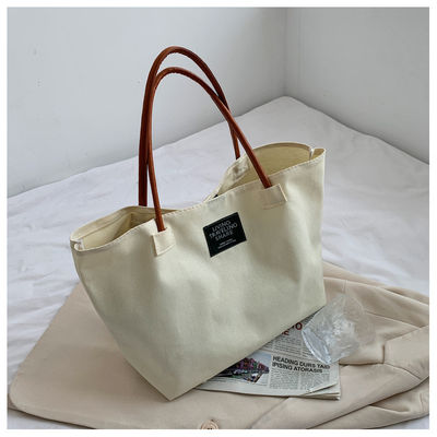 Última moda logotipo personalizado de lona bolso de grande capacidade bolsa de um único ombro estudante