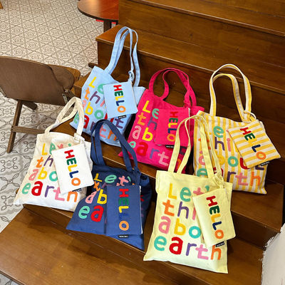 Carta bordada colorida Bolsa de ombro de lona Uma escolha funcional e elegante