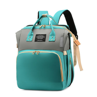 Mochila de fraldas de viagem O mais recente estilo de moda com cama de berço dobrável à prova d'água
