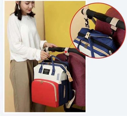 Mochila de fraldas de viagem O mais recente estilo de moda com cama de berço dobrável à prova d'água