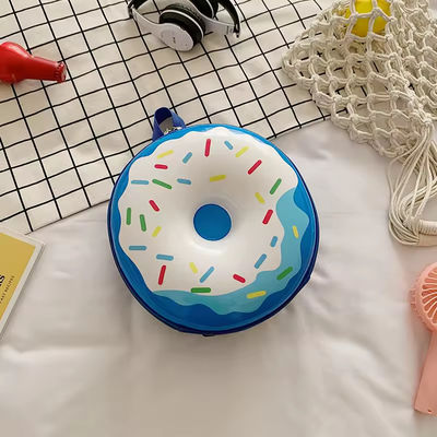 Novidade Saco de livros fofinho 2024 Mochila de desenhos animados Donuts Saco escolar de borracha para a vida diária