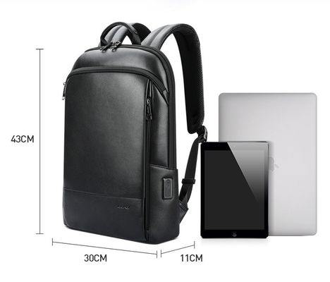 Mochila de laptop de couro de grande capacidade para homens com porta de carregamento USB anti-roubo