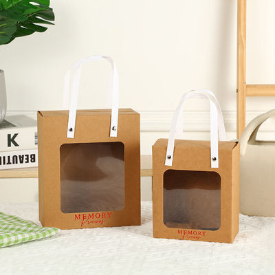 Bolsa de papel de mão Kraft impressa sob medida para embalagens de varejo Roupas sapatos Presentes de pele