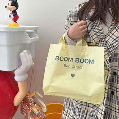 Logotipo personalizado Aceito Manos de Loop Suave Tote Saco de compras de plástico para embalagem de roupas