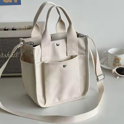 O mais novo estilo de moda de lona Crossbody Bolsa de compras com correia ajustável