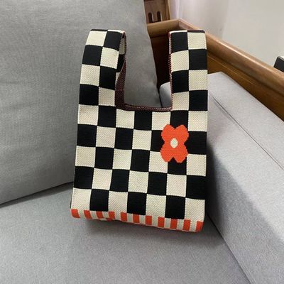 Saco de mão de tricô de crochê tecido 2024 O mais recente estilo de moda para sacos de praia de malha