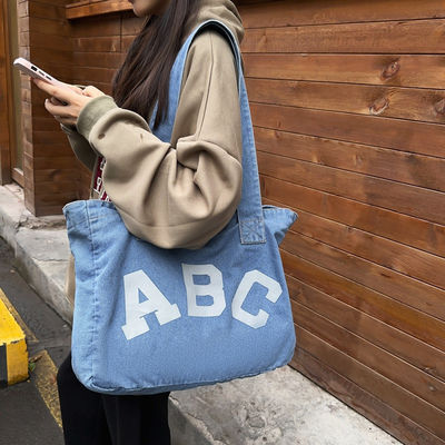 Impressão personalizada de sacos de praia tecidos de denim com estilo de loop macio e aceitação OEM / ODM