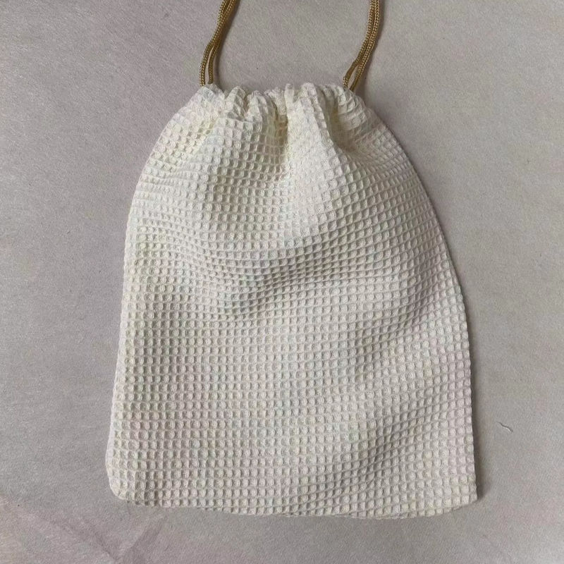 Produto OEM/ODM Aceito Saco de armazenamento cosmético de tecido de waffle em branco para necessidades de cuidados com a pele