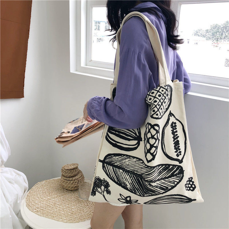Estilo Impressão de folhas Saco de tela espessa Grande capacidade Mercadorias Com Logotipo Personalizado